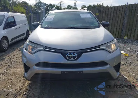 2016 Toyota Rav4 Le z USA, uszkodzony, nr VIN 2T3ZFREV7GW307055